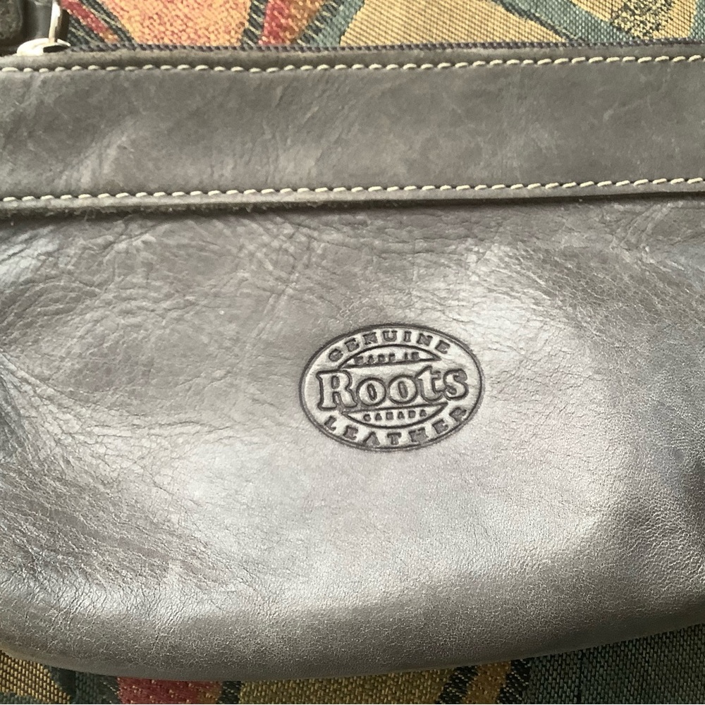 Roots Leather Wristlet in a Soft Weathered Gray